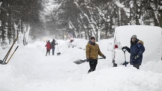 Citizens shovel snow after snowfall in Buffalo, New York, United States on December 26.